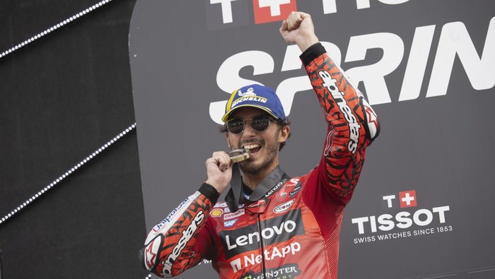 SPIELBERG, AUSTRIA - AUGUST 17: Francesco Bagnaia celebrates the victory on the podium in the fans zone during the MotoGP Of Austria - Sprint at Red Bull Ring on August 17, 2024 in Spielberg, Austria. (Photo by Mirco Lazzari gp/Getty Images)