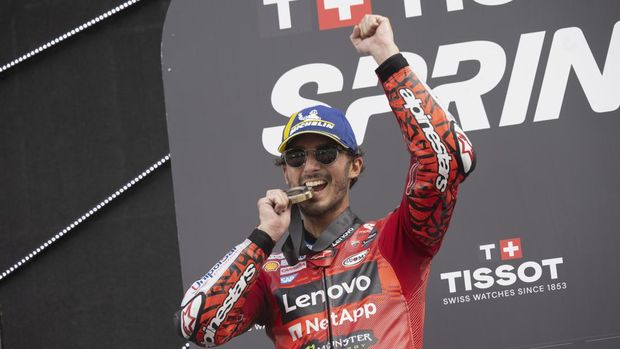 SPIELBERG, AUSTRIA - AUGUST 17: Francesco Bagnaia celebrates the victory on the podium in the fans zone during the MotoGP Of Austria - Sprint at Red Bull Ring on August 17, 2024 in Spielberg, Austria. (Photo by Mirco Lazzari gp/Getty Images)