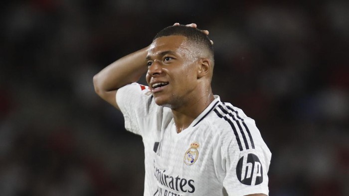 Real Madrids Kylian Mbappe reacts during a Spanish La Liga soccer match between Mallorca and Real Madrid at the Son Moix Stadium in Palma de Mallorca, Spain, Sunday, Aug. 18, 2024. (AP Photo/Francisco Ubilla)