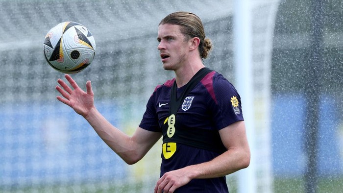 BLANKENHAIN, GERMANY - JULY 08: Conor Gallagher of England gets caught in a sprinkler during a training session at Spa & Golf Resort Weimarer Land on July 08, 2024 in Blankenhain, Germany. (Photo by Eddie Keogh - The FA/The FA via Getty Images)