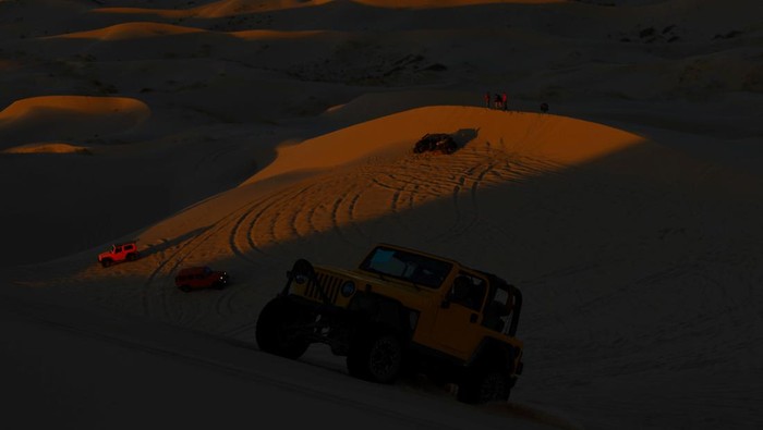 A drone view shows tourists visiting the Samalayuca dunes in the Chihuahua desert on the outskirts of Ciudad Juarez, Mexico August 18, 2024. REUTERS/Jose Luis Gonzalez