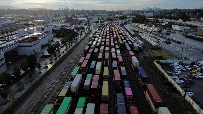 A drone view shows a freight train and box cars sitting idle at a Canadian National Railway Co. Yard after the company locked out workers during an ongoing contract dispute in Vancouver, British Columbia, Canada August 22, 2024. REUTERS/Jesse Winter