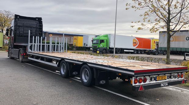 Step deck trailer.