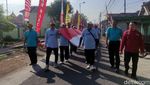 Warga Sidoarjo Bentangkan Bendera 79 Meter Peringati HUT RI