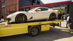 Deretan Mobil Mewah Disita dari Rumah Influencer Kontroversial Andrew Tate