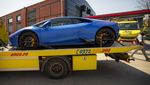 Deretan Mobil Mewah Disita dari Rumah Influencer Kontroversial Andrew Tate