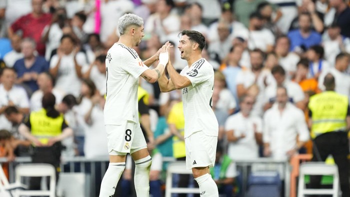 Brahim Diaz attacking midfield of Real Madrid and Spain celebrates after scoring his sides first goal during the La Liga match between Real Madrid CF and Real Valladolid CF at Estadio Santiago Bernabeu on August 25, 2024 in Madrid, Spain. (Photo by Jose Breton/Pics Action/NurPhoto via Getty Images)