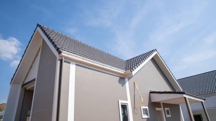 new house with a concrete roof under construction