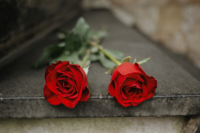Flowers at a street memorial honoring victims