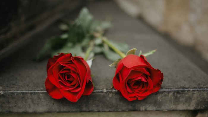Flowers at a street memorial honoring victims