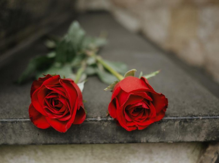 Flowers at a street memorial honoring victims