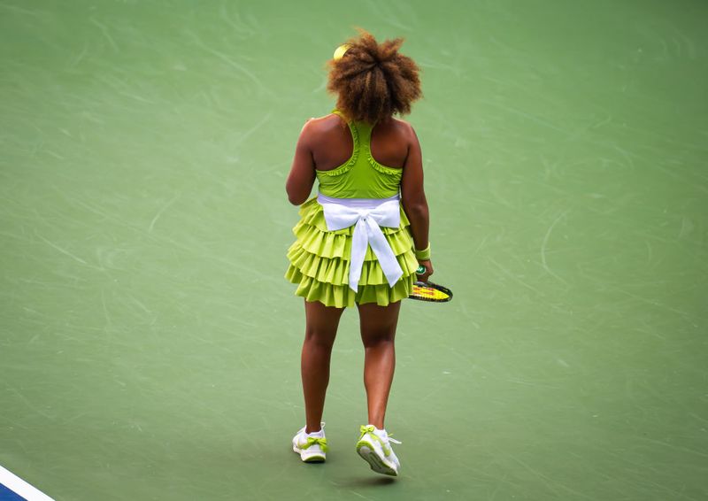 Foto Naomi Osaka di US Open 2024 NEW YORK, NEW YORK - AUGUST 27: Naomi Osaka of Japan in action against Jelena Ostapenko of Latvia in the first round on Day 2 of the US Open at USTA Billie Jean King National Tennis Center on August 27, 2024 in New York City (Photo by Robert Prange/Getty Images)