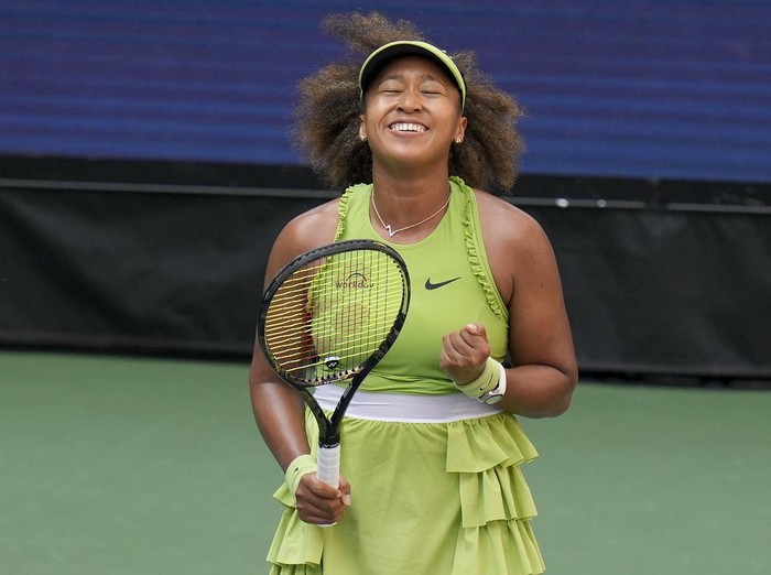 Naomi Osaka, of Japan, reacts after defeating Jelena Ostapenko, of Latvia, during the first round of the U.S. Open tennis championships, Tuesday, Aug. 27, 2024, in New York. (AP Photo/Seth Wenig)