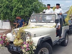 Hari Wuryanto-dr Purnomo Daftar Pilbup Madiun Naik Jip Janur Kuning