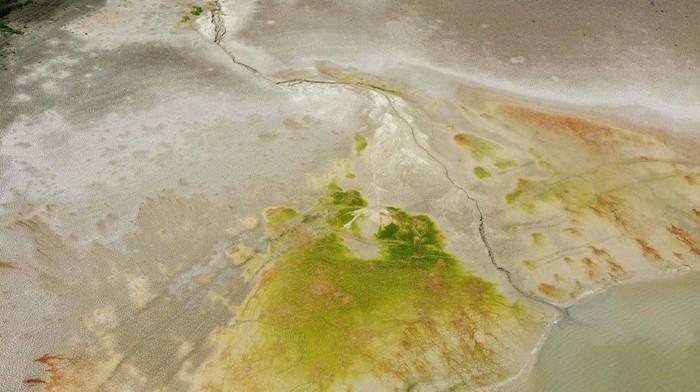 A drone picture shows the Fanaco Lake following a drought on the Italian island of Sicily, in Palermo, Italy, August 26, 2024. REUTERS/Louiza Vradi