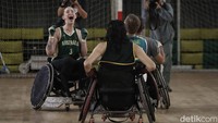 Ekspresi atlet rugby kursi roda Australia usai mencetak gol.
