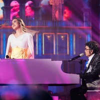 Raisa tampil anggun dan elegan mengenakan gaun putih rancangan desainer Pamela Usanto. Foto: Instagram/@raisa6690 @davianakbar