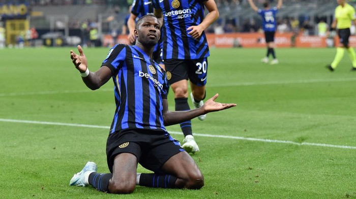 MILAN, ITALY - AUGUST 30: 9	Marcus Thuram of FC Internazionale celebrates after scoring goal 4-0 during the Serie A match between FC Internazionale and Atalanta at Stadio Giuseppe Meazza on August 30, 2024 in Milan, Italy. (Photo by Giuseppe Bellini/Getty Images)
