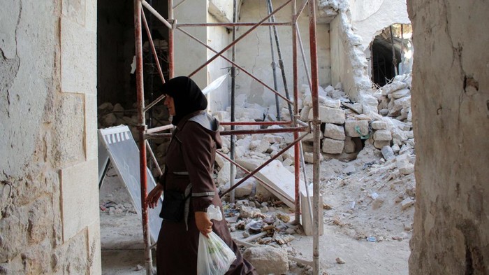 People walk at Aleppos old souks which reopened after undergoing extensive restoration after enduring significant damage from the Syrian war, in Aleppo, Syria August 28, 2024. REUTERS/Firas Makdesi