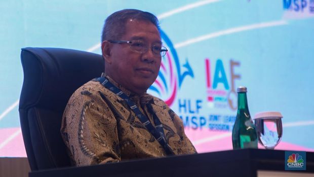 Deputi Bidang Politik, Hukum, Pertahanan dan Keamanan Kementerian PPN/Bappenas, Bogat Widyatmoko menyampaikan keterangan saat konferensi pers di Bali Nusa Dua Convention Center (BNDCC), Nusa Dua, Bali, Minggu (1/8/2024). (CNBC Indonesia/Faisal Rahman)