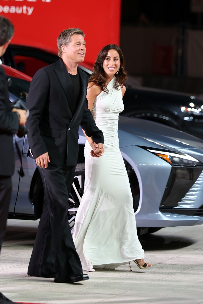 VENICE, ITALY - SEPTEMBER 01: Brad Pitt and Ines de Ramon attend the 