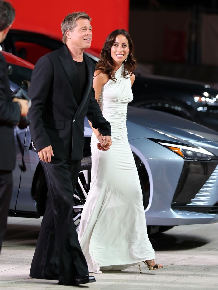 VENICE, ITALY - SEPTEMBER 01: Brad Pitt and Ines de Ramon attend the Wolfs red carpet during the 81st Venice International Film Festival on September 01, 2024 in Venice, Italy. (Photo by Daniele Venturelli/WireImage)