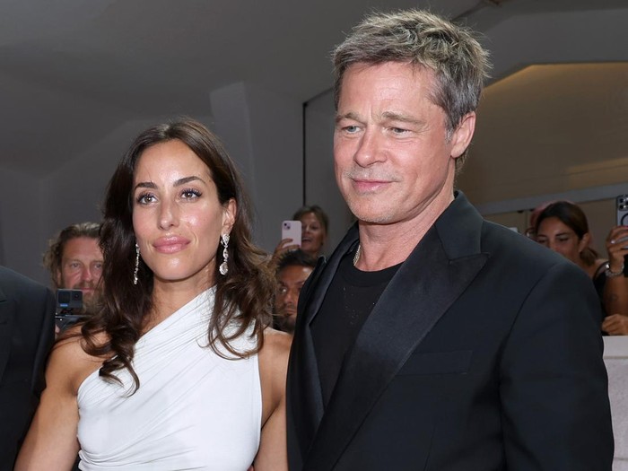 VENICE, ITALY - SEPTEMBER 01: Ines de Ramon and Brad Pitt attend the 