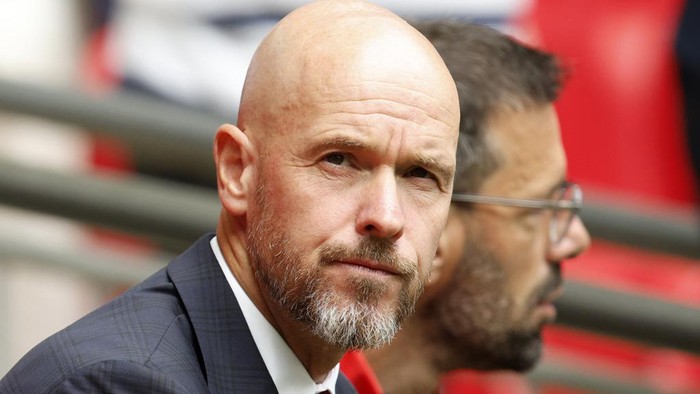 Manchester United manager Erik ten Hag watches his team during the FA Community Shield final soccer match between Manchester City and Manchester United at Wembley Stadium in London, Saturday, Aug. 10, 2024. (AP Photo/David Cliff)