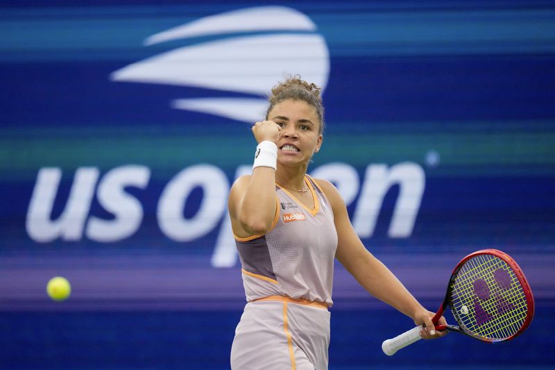 Jasmine Paolini, of Italy, reacts after scoring a point against Yulia Putintseva, of Kazakhstan, of the United States, during the third round of the U.S. Open tennis championships, Saturday, Aug. 31, 2024, in New York. (AP Photo/Kirsty Wigglesworth)