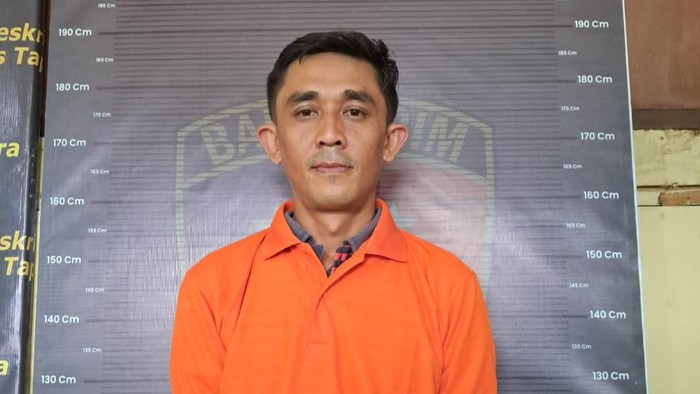 Pelaku BSH saat diamankan di kantor polisi. (Dok. Porles Taput)
