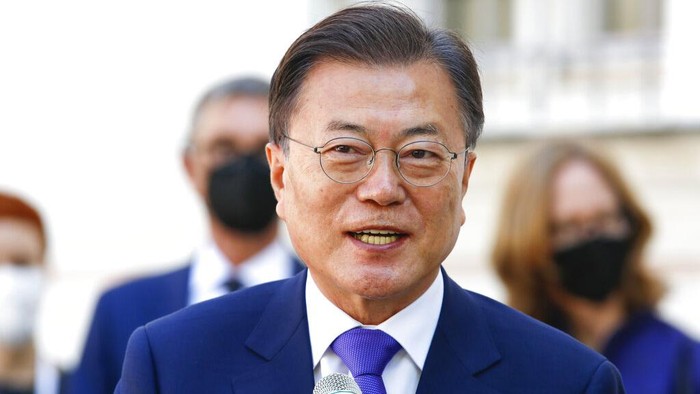 The President of South Korea, Moon Jae-in, speaks during his joint visit with the Austrian President Alexander Van der Bellen to the Stift Heiligenkreuz (Holy Cross Monastery) in Heiligenkreuz im Wienerwald, Austria, Tuesday, June 15, 2021. (AP Photo/Lisa Leutner)