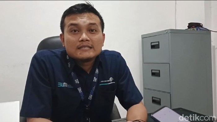 Deputi EGM KCU Pos Palembang Andi Johan.