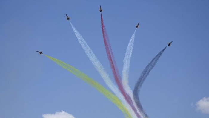 Chinese J-10 fighter jets performs during the first edition of the Egypt International Airshow at al-Alamein airport, Wednesday, Sept. 4, 2024. (AP Photo/Amr Nabil)