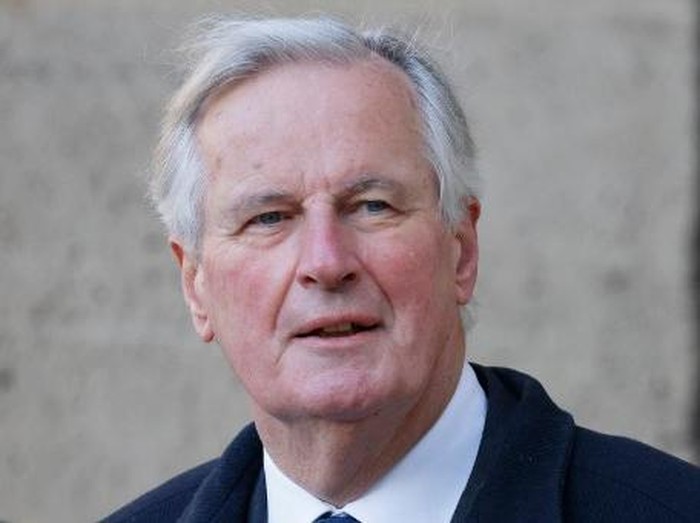 French politician and former European Union chief negotiator Michel Barnier leaves after  an emergency executive board meeting called by French right-wing party Les Republicains (LR) vice-president Annie Genevard at the Musee Social in Paris on June 12, 2024. The president of the French right-wing party Les Republicains (LR) is threatened to be expelled after calling for an alliance with French far-right party Rassemblement National (RN), ahead of snap elections for a new National Assembly. (Photo by Dimitar DILKOFF / AFP)