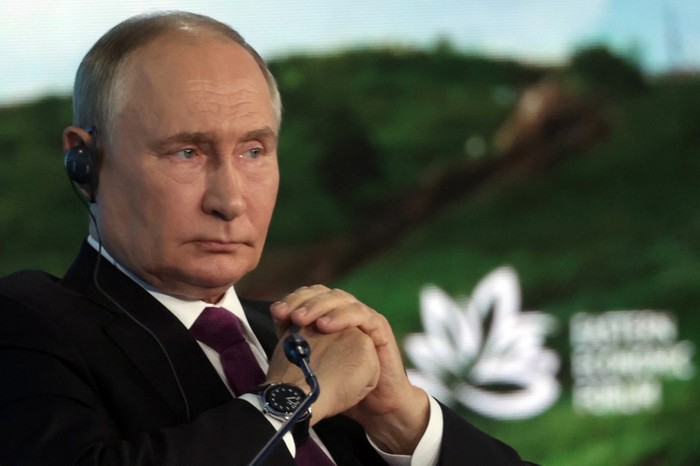 In this pool photograph distributed by the Russian state agency Sputnik, Russias President Vladimir Putin attends a plenary session of the Eastern Economic Forum in Vladivostok on September 5, 2024. (Photo by Vyacheslav PROKOFYEV / POOL / AFP)