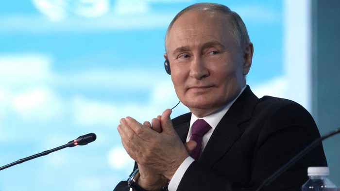 In this pool photograph distributed by the Russian state agency Sputnik, Russias President Vladimir Putin attends a plenary session of the Eastern Economic Forum in Vladivostok on September 5, 2024. (Photo by Vyacheslav PROKOFYEV / POOL / AFP)