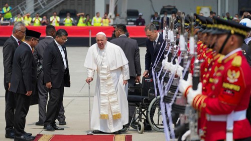 Pope Francis is assisted out of a car ahead of his departure from Jakarta Soekarno-Hatta International Airport, Indonesia, Friday, Sept. 6, 2024. Tatan Syuflana/Pool via REUTERS