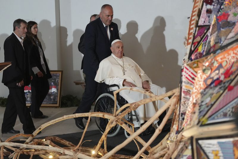 Pope Francis arrives on his wheelchair at Grha Pemuda Youth Center in Jakarta, Indonesia, Wednesday, Sept. 4, 2024. (AP Photo/Tatan Syuflana, Pool)