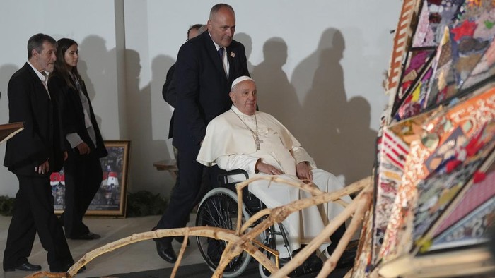 Pope Francis arrives on his wheelchair at Grha Pemuda Youth Center in Jakarta, Indonesia, Wednesday, Sept. 4, 2024. (AP Photo/Tatan Syuflana, Pool)