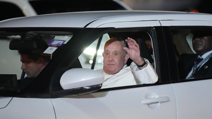 Pope Francis leaves the tarmac in a waiting car at Jacksons International Airport in Port Moresby, Papua New Guinea, Friday, Sept. 6, 2024. (AP Photo/Mark Baker)