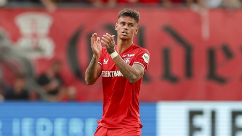 Mees Hilgers of FC Twente Enschede celebrates after scoring his teams first goal during the UEFA Champions League Third Qualification Round - Second Leg match between Twente Enschede and RB Salzburg at Grolsch Veste on August 13, 2024 in Enschede, Netherlands. (Photo by Marco Steinbrenner/DeFodi Images via Getty Images)