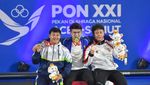 Rizki Juniansyah Pecahkan Rekor Nasional Angkat Besi di PON XXI