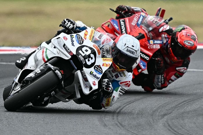 Gresini Racing MotoGPs Spanish rider Marc Marquez leads ahead of Ducati Lenovo Teams Italian rider Francesco Bagnaia  during the San Marino MotoGP race at the Misano World Circuit Marco-Simoncelli in Misano Adriatico on September 8, 2024. (Photo by Gabriel BOUYS / AFP)