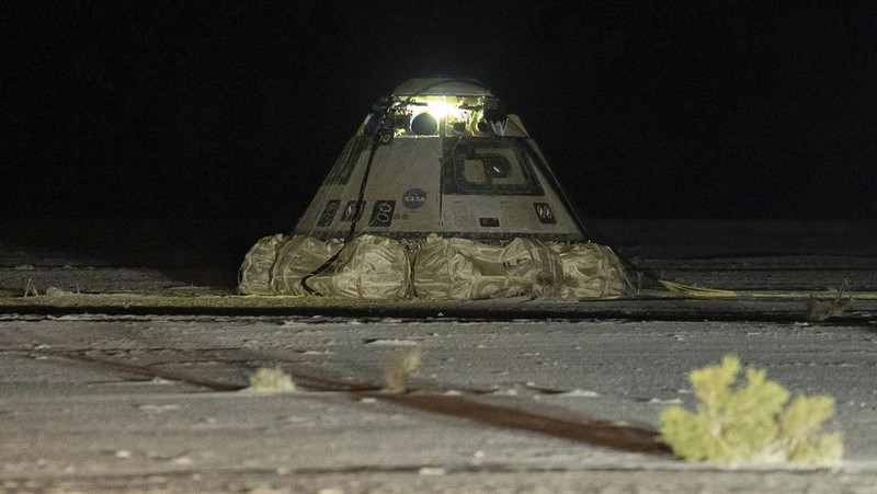The empty Boeing Starliner capsule sits at White Sands Missile Range in New Mexico, late Friday, Sept. 6, 2024, after undocking from the International Space Station. (Boeing via AP)