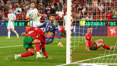 Soccer Football - Nations League - League A - Group 1 - Portugal v Scotland - Estadio da Luz, Lisbon, Portugal - September 8, 2024 Portugals Cristiano Ronaldo scores their second goal REUTERS/Pedro Nunes