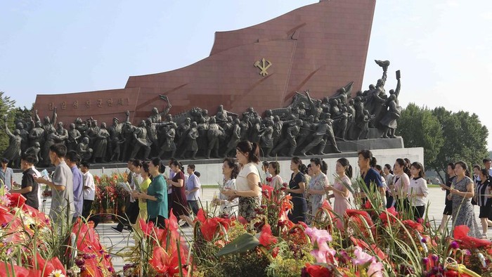 Pyongyang citizens pay respect to the statues of their late leaders Kim Il Sung and Kim Jong Il on Mansu Hill on the occasion of the country's 76th founding anniversary in Pyongyang, North Korea Monday, Sept. 9, 2024. (AP Photo/Jon Chol Jin)