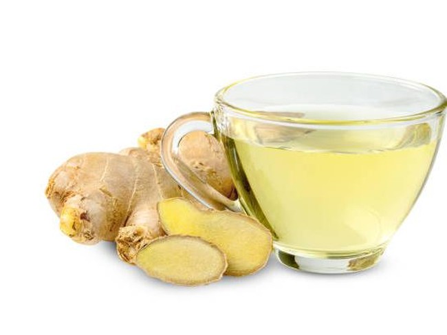 ginger tea in glass cup isolated on white background  ,include clipping path