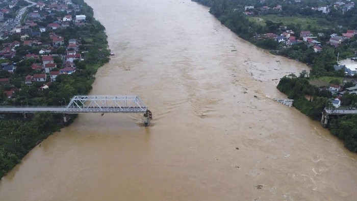 A bridge collapse due to floods triggered by typhoon Yagi in Phu Tho province, Vietnam on Monday, Sept. 9, 2024 (Bui Van Lanh/ VNA via AP)