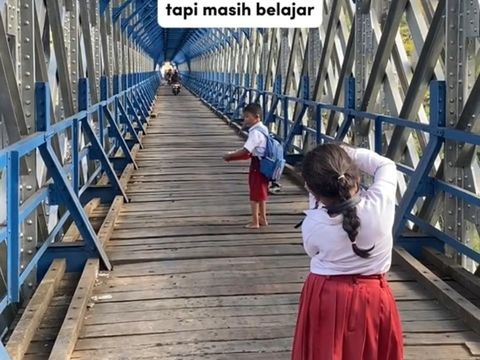 Kinanti (9) anak asal Ciamis yang viral karena jago motret