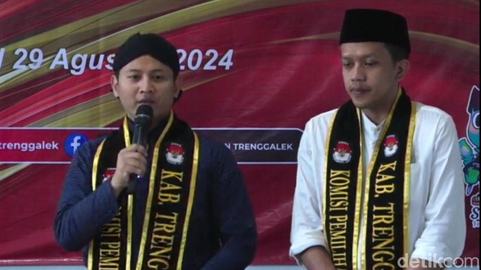 Pasangan calon petahana Arifin-Syah, yang telah mengajukan cuti kampanye.